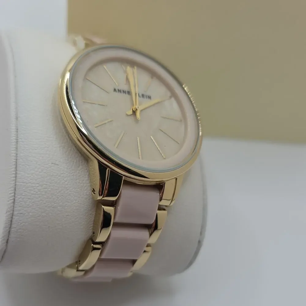 Anne Klein Women’s Analog Watch Pink Dial Gold-Tone Bracelet Roman Numerals Box